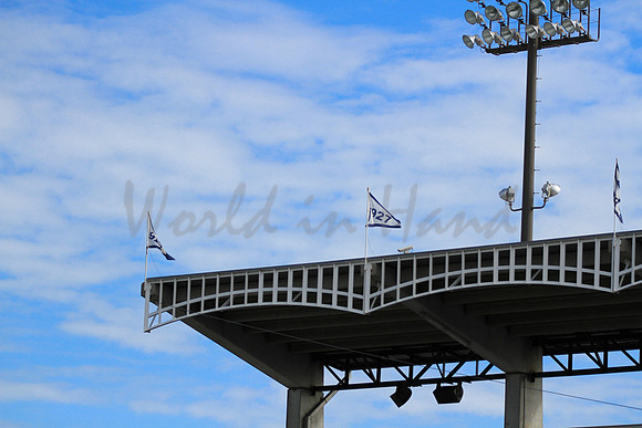 Stadium lights on a blue sky