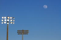 Stadium lights on a blue sky