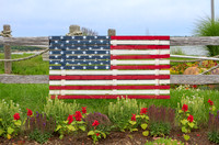 Rustic American flag on a fence